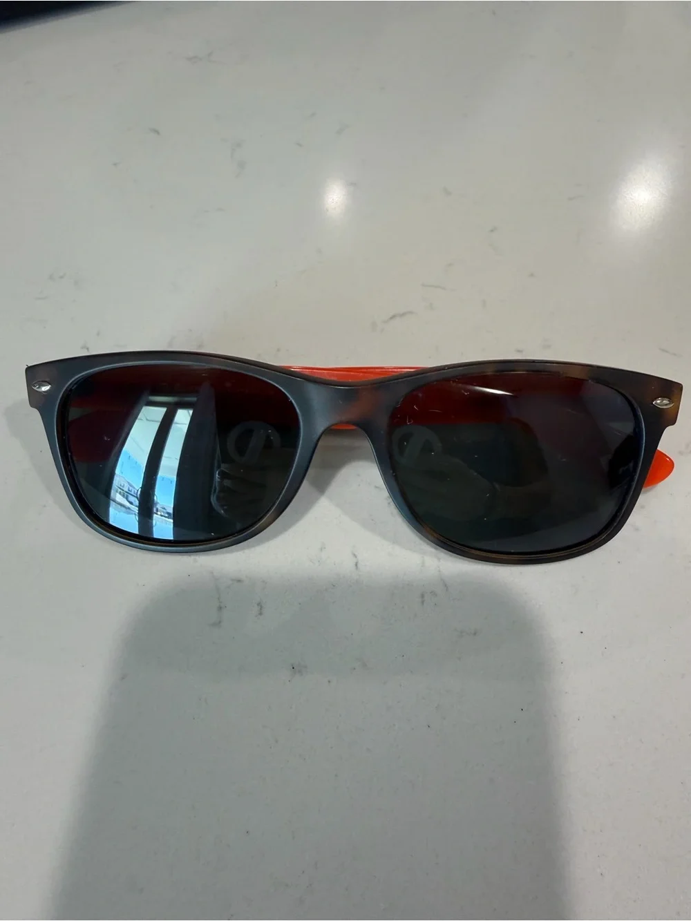 Ray-Ban Wayfarer Sunglasses with Navy/Orange Temples. Tortoiseshell frames.
